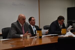 Committee members Del. Todd Gilbert (left), Del. Tommy Wright (center) and Del. Matthew Farris (right) discuss HB1418. Photo by Nick Versaw.