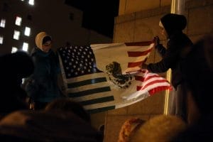 Demonstrators gathered outside the Federal Court House in protest of Donald Trump. Photo by Jessica Nolte