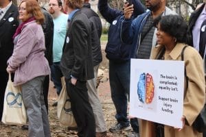 Dozens of survivors, advocates and caretakers held a rally last Wednesday, calling for improvements in state services. Photo by Maura Mazurowski.